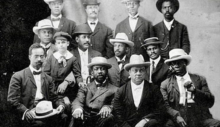 A photo illustration of some of the attendees at the first Niagara Conference meeting in Fort Erie, Canada, in 1905. From left, top row: H.A. Thompson, Alonzo F. Herndon, John Hope, possibly James R.L. Diggs. Second row: Fred McGhee, Norris B. Herndon, J. Max Barber, W.E.B. Du Bois, Robert Bonner. Bottom row: Henry L. Baily, Clement G. Morgan, W.H.H. Hart, B.S. Smith. — Library of Congress photo