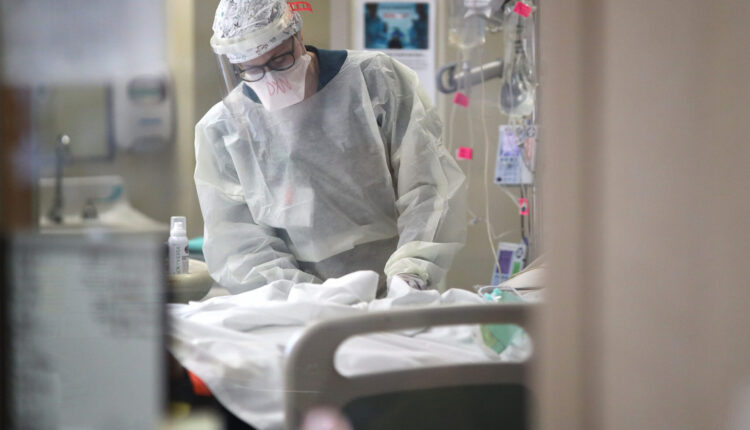A nurse treats a patient with coronavirus in the intensive care unit at a hospital on May 1, 2020, in Leonardtown, Maryland. (Win McNamee/Getty Images)
