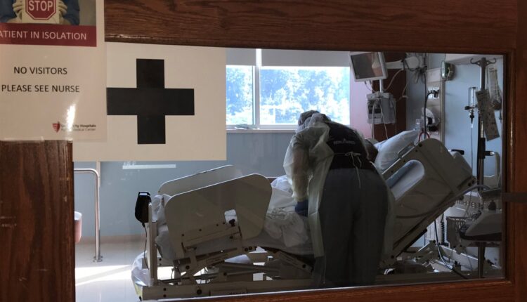 Medical staff tend to a COVID-19 patient. Courtesy of University Hospitals