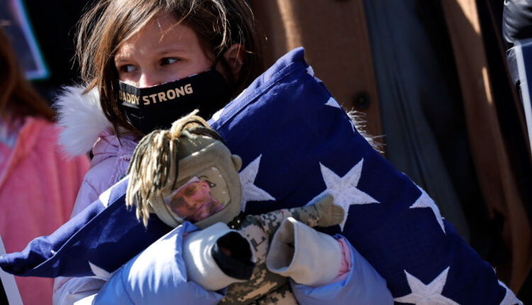 Brielle Robinson, daughter of the late Army Sgt. First Class Heath Robinson, joins veterans advocacy groups, activists, politicians and fellow victims’ families during a news conference about military burn pits legislation outside the U.S. Capitol on March 29, 2022 in Washington, DC. President Biden has said burn pits — which incinerated medical and hazard material, jet fuel and other substances — were one of the many dangers U.S. soldiers faced during deployments. (Photo by Chip Somodevilla/Getty Images)