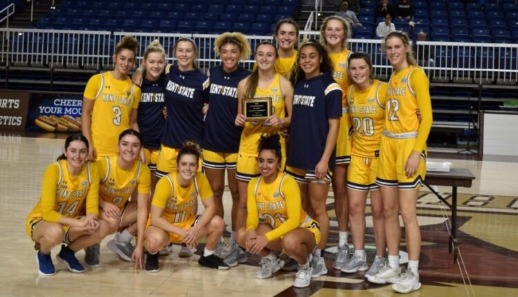 The+Kent+State+womens+basketball+players+hold+the+Christmas+Classic+Trophy+Nov.+27.+The+team+won+the+title+after+defeating+Quinnipiac+and+Southern+Illinois.++