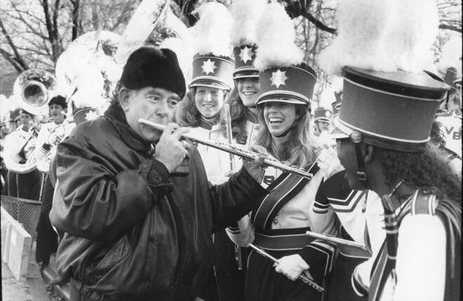 November 24, 1988 - Entertainer Robin Leach got smiles from members of the Vero Beach High School Marching Band, which performed in its first Macy's Thanksgiving Day Parade under the direction of James and Sheila Sammons.