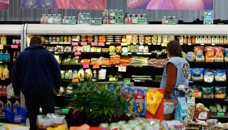 Customers shop for fresh fruits and vegetables at Campbell’s Market, April 24, 2023, in McArthur, Ohio. Campbell’s has worked to provide healthy food options to the McArthur community. (Photo by Graham Stokes for the Ohio Capital Journal).